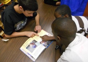 Students reading a book